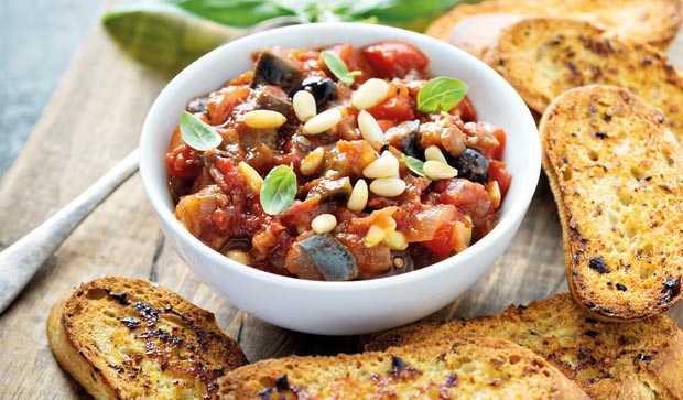 Eggplant caponata crostini or bruschetta on garlic bread