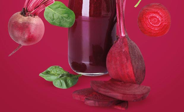 Bottle of fresh vegetable juice and flying ingredients on color